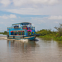 Buy canvas prints of ferry boat at the Tonle Sap Lake in the Siem Reap Province Cambodia by Wilfried Strang