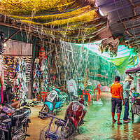 Buy canvas prints of When the big Rain comes to the Chongchom Market in Surin somewhere in Isan Thailand by Wilfried Strang