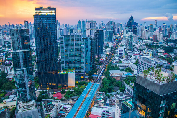 The Cityscape, the Railway of the Skytrain and the skyscraper of Bangkok in Thailand Southeast Asia at the Evening Picture Board by Wilfried Strang