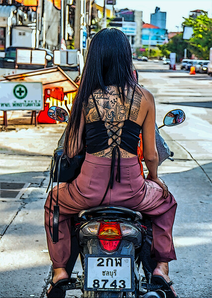 a young tattooed Thai woman on a motorcycle Picture Board by Wilfried Strang