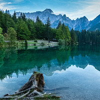 Buy canvas prints of Panoramic View of Lake Fusine with Julian Alps in  by Maggie Bajada