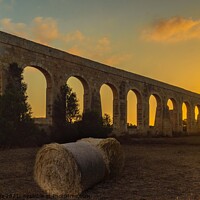 Buy canvas prints of Sunset with Stone Arches and Hay bales, Gozo, Malt by Maggie Bajada