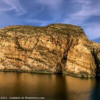 Buy canvas prints of Reflection of Rock Formation surronded with blue s by Maggie Bajada