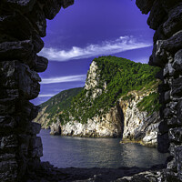 Buy canvas prints of Framed Window made of Black stones, inside a Mountain with Green grass.  by Maggie Bajada