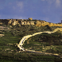 Buy canvas prints of Landscape of Gozo Hill walking towards the White L by Maggie Bajada