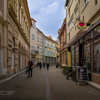 Buy canvas prints of Colorful Streets of Eger Town in Hungary. by Maggie Bajada