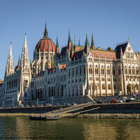 Buy canvas prints of Colorful buildings of Hungarian Parliament in Budapest.  by Maggie Bajada