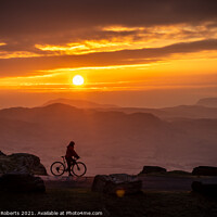 Buy canvas prints of Cyclist's silhouette durning Sunrise by Gerwyn Roberts