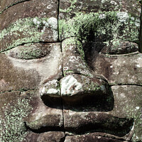 Buy canvas prints of Stone face at Angkor Thom, Cambodia by Ian Miller
