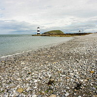 Buy canvas prints of Stony Beach at Penmon Point, Anglesey by Ian Miller