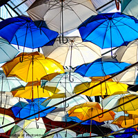 Buy canvas prints of Decorative Umbrellas by Ian Miller
