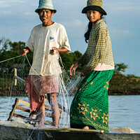 Buy canvas prints of Couple Fishing on the Mekong River, Vietnam by Ian Miller