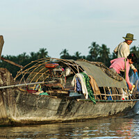 Buy canvas prints of Fishing boat on the Mekong River by Ian Miller