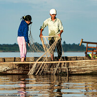 Buy canvas prints of Fishing the Mekong River, Vietnam by Ian Miller