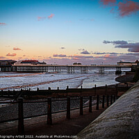 Buy canvas prints of Cromer Pier looking along the Seawall by GJS Photography Artist