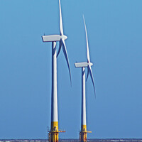 Buy canvas prints of Wind Turbines in Choppy Seas by GJS Photography Artist