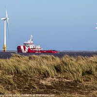 Buy canvas prints of Rescue Ship Passing Wind Turbines by GJS Photography Artist