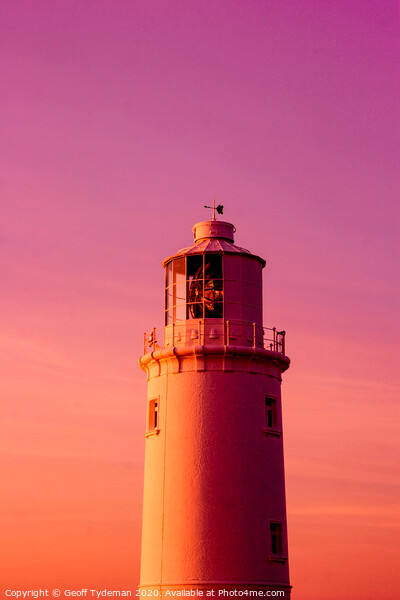 Lighthouse at sunset Picture Board by Geoff Tydeman