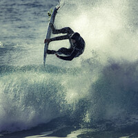 Buy canvas prints of A surfer takes to the 'air' by Geoff Tydeman