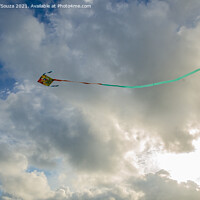 Buy canvas prints of Kite flying against backdrop of beautiful clouds by Lucas D'Souza