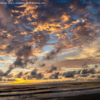 Buy canvas prints of Color play of sun and clouds on the beach by Lucas D'Souza