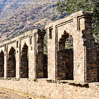 Buy canvas prints of Stone wall with arches  by Lucas D'Souza