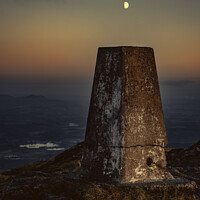 Buy canvas prints of Moon over the Cairn on Summit of Ben Ledi, Scotland at Dusk by Ivor Bond