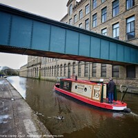 Buy canvas prints of Canal boat at Saltaire by Victoria Copley