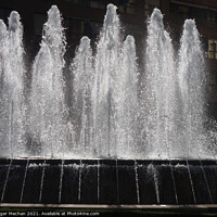 Buy canvas prints of The Beauty of Leon's Sprinkler Fountain by Roger Mechan