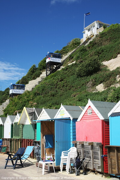 Charming Pastel Beach Huts Picture Board by Roger Mechan