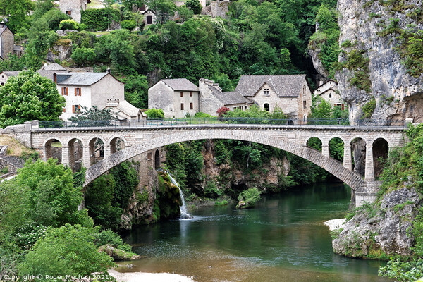 Idyllic Stone Village with Arched Bridge Picture Board by Roger Mechan