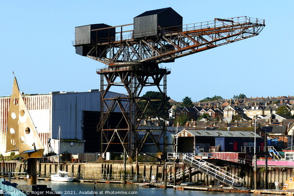 Hammerhead crane on Cowes Isle of Wight Picture Board by Roger Mechan