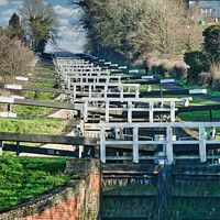Buy canvas prints of Ascending the Caen Hill Locks by Roger Mechan