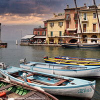 Buy canvas prints of Serene Beauty: The Harbour at Malcesine Lake Garda by Roger Mechan