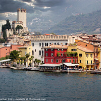 Buy canvas prints of Overlooking Malcesine Castle on Lake Garda by Roger Mechan