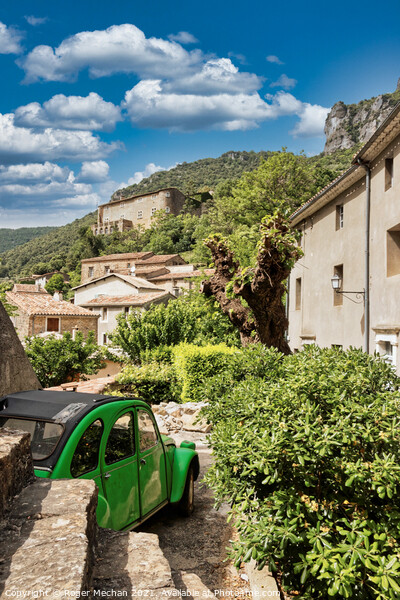 Vintage Citroen in a picturesque Provencal village Picture Board by Roger Mechan