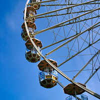 Buy canvas prints of Captivating Ferris Wheel Ride by Roger Mechan