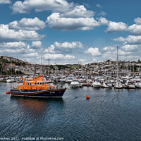 Buy canvas prints of Brixham lifeboat and marina  by Roger Mechan