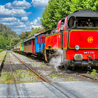 Buy canvas prints of Vintage Steam Train through the French Countryside by Roger Mechan