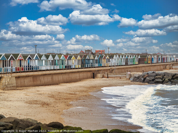 Lively Beach Huts by the Rocky Shore Picture Board by Roger Mechan