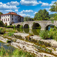 Buy canvas prints of Serene Bridge and Monastery in Cantabria by Roger Mechan