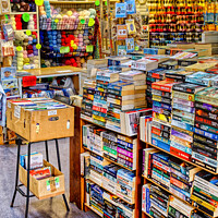 Buy canvas prints of Vibrant Paperback Haven by Roger Mechan