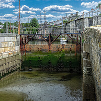 Buy canvas prints of Tranquil Lock Gates of Charlestown Harbour by Roger Mechan