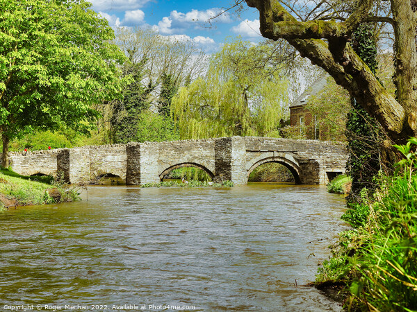 Ancient Stone Bridge Amidst a Flood Picture Board by Roger Mechan