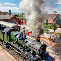 Buy canvas prints of Steam Train Departing Taunton by Roger Mechan