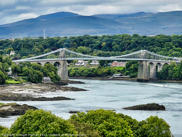 Crossing the Iconic Menai Bridge Anglesey Picture Board by Roger Mechan
