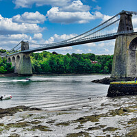 Buy canvas prints of Menai suspension bridge Wales from the foreshore by Roger Mechan