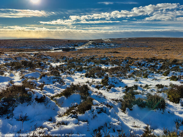 Dartmoor. Lonely road and snowy moorland. Picture Board by Roger Mechan