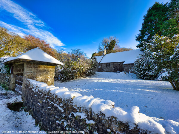Dartmoor church in the snow Picture Board by Roger Mechan