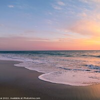 Buy canvas prints of Beautiful colorful sunset at the beach by Stan Lihai